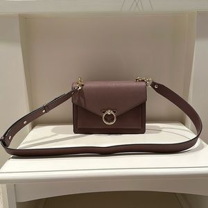 Rebecca Minkoff neutral colored leather purse; NEVER USED